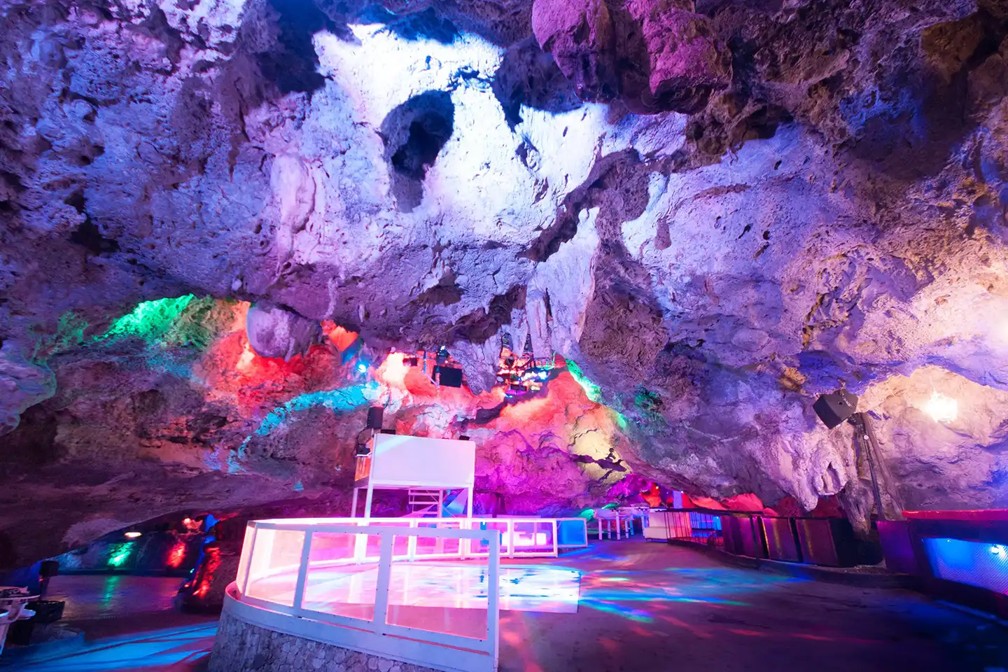 people dancing at a real cave