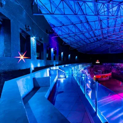 Illuminated natural cave interior at Imagine Punta Cana — view 3